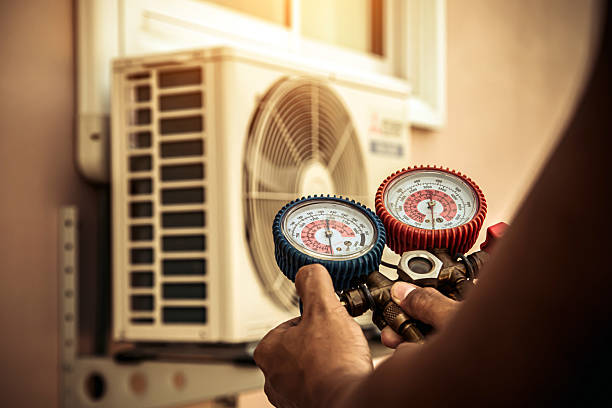 Professional Ac Installation technician working in Lake Mills, IA